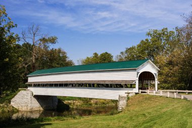 A Wooden Covered Bridge in the countyside of rural America, USA, North America clipart