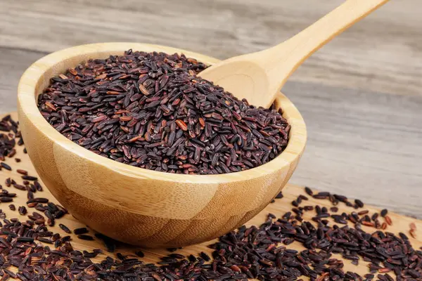 Wooden Bowl Delicious Healthy Black Rice Isolated Wooden Background Copy — Stock Photo, Image