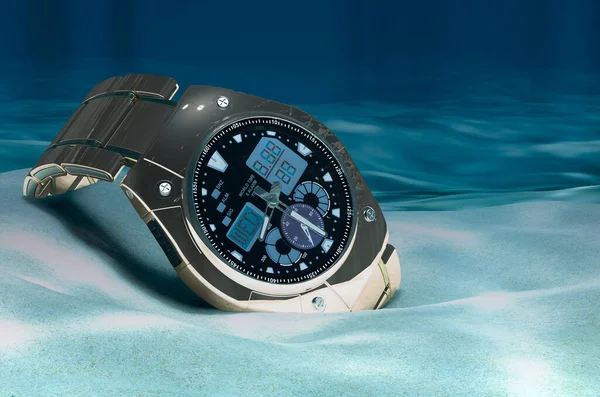 Analog Digital Wrist Watch for men on ocean bottom underwater, 3D rendering