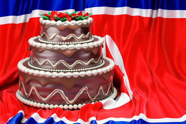 Chocolate cake on the North Korean flag background, 3D rendering