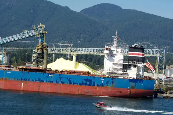 stock image Vancouver Sulphur Works Vancouver with a bulk carrier