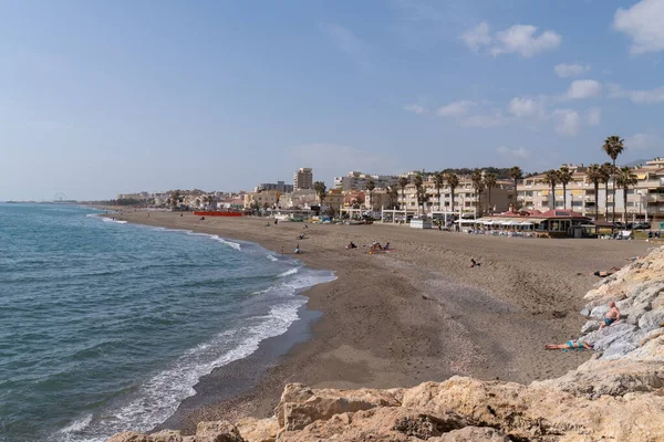 stock image Tourists and visitors enjoying the beautiful beach at La Carihuela, Torremolinos, Spain, Costa Del Sol on Thursday 23rd February 2023