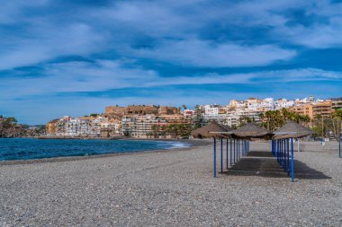 Sun shades and parasols Almunecar Spain La Herradura beach Costa del Sol Andalusia clipart