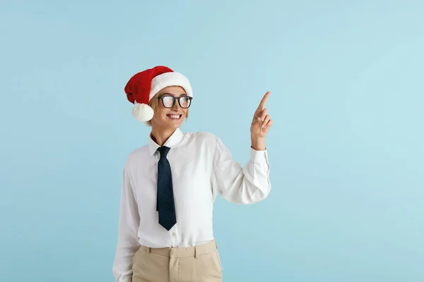 stock image Smiling Businesswoman Pointing Hand. Positive Caucasian Lady Pointing Up Paying Your Attention at Empty Space for Advertisement. Indoor Studio Shot Isolated on Blue Background 