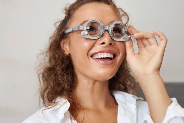 Eyesight Test Cheerful Girl Optometrist Trial Frame Looking Away Smiling — ストック写真
