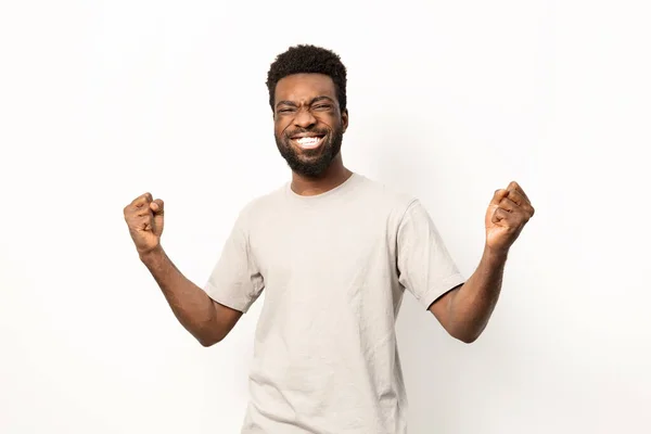 Portrait Happy African American Man Celebrating Fists Raised Exuding Joy — Stock Photo, Image