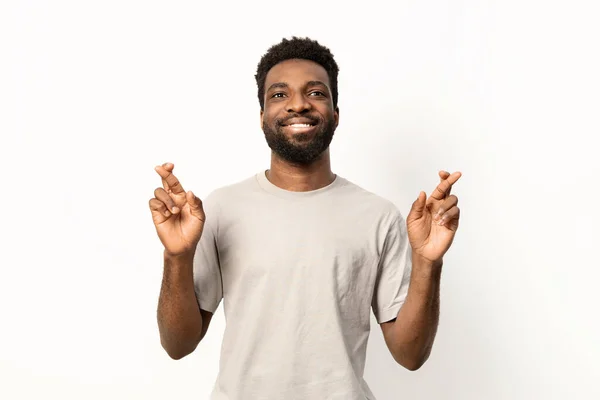 Portrait Cheerful Man Crossing Fingers Good Fortune Smiling White Background — Stock Photo, Image