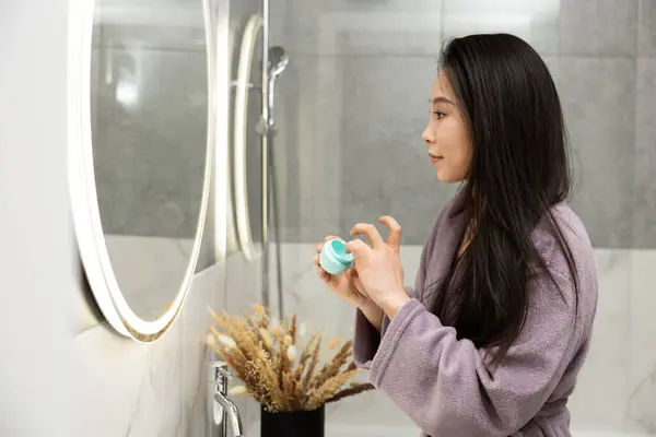 Young Woman Bathrobe Using Skin Care Products Bathroom Wellness Beauty — Stock Photo, Image
