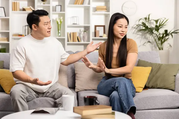 Adult Couple Engages Serious Discussion Sitting Home Couch Expressing Emotions — Stock Photo, Image