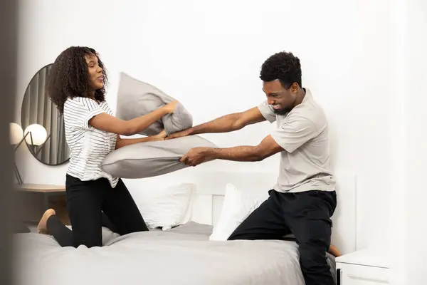 Couple Pillow Fight Joyful Moment Modern Bedroom Stock Photo