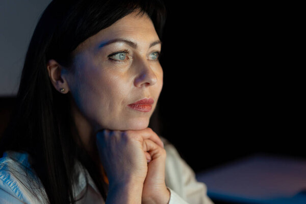 Thoughtful Woman Deep Contemplation Gazing Intensity Focus Illuminated Soft Light Stock Photo