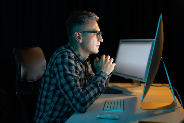Focused Man Working Late Front Computer Screen Office Royalty Free Stock Photos