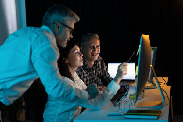 Team Collaboration Office Three Colleagues Working Together Computer Discussing Project Stock Photo