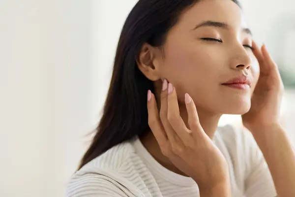 stock image Face Skin Care. Woman With Radiant Skin Indulging In Beauty Ritual, Exuding Calmness And Self-Care. Perfect Concept For Skincare, Wellness, And Tranquility.