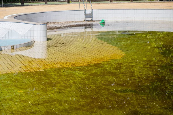 stock image abandoned pool with stagnant and dirty water