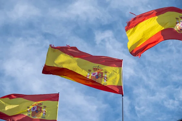 three flags of Spain Waving in the wind