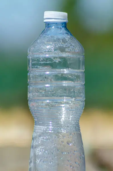 Empty plastic water bottle, ecological concept