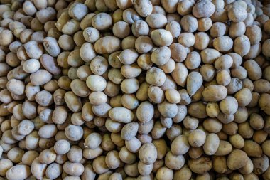 İstiflenmiş patates yığını, arka plan için doku. Organik tarım