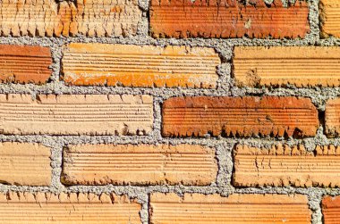 Tuğla duvar dokusunun arka planı. Tuğla duvar dokusunu kapat. Ayrıntılı fotoğrafçılık