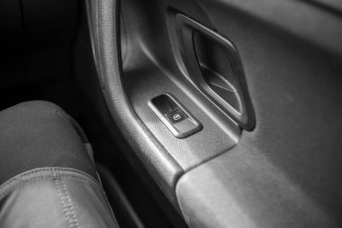 detail of the front passenger door of a car, black and white clipart