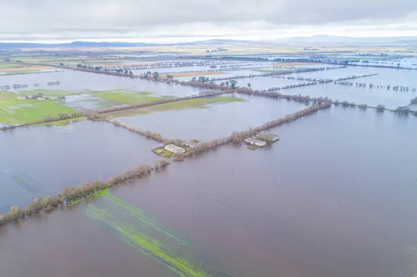 crop fields flooded by spring rains in the region of A Limia, Galicia. Spain. Climate change concept