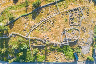 Aerial drone view of the archaeological site of the Citania of Santa Luzia, ruins of a hillfort in Viana do Castelo. clipart