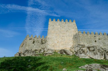 Castle walls of the medieval town of Trancoso, Portugal. Medieval architecture. clipart