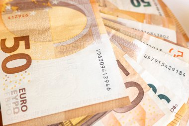 desenli arka plan olarak çok sayıda 50 euro banknot
