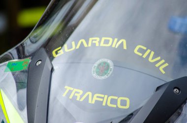 madrid, spain 08-10-2024: windshield of a Guardia Civil motorcycle, law enforcement in Spain clipart