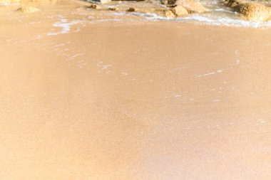 Güneşli bir Sahilde Altın Kum dokusu