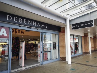 Swansea, UK: December 01, 2020: Debenhams is a leading international, multi-channel department store destination with a proud British heritage which trades from over 200 stores across 18 countries. clipart