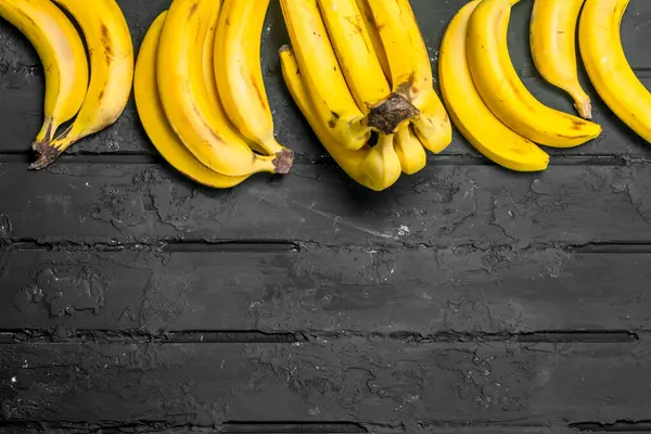 Whole Fresh Bananas Black Rustic Background — Stock Photo, Image