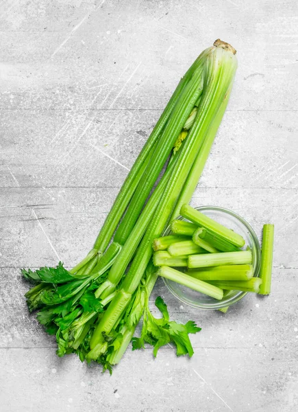 Pieces Celery Glass Bowl White Rustic Background — Stock Photo, Image