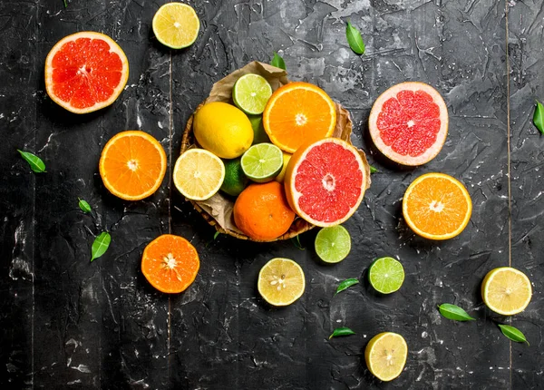 stock image Ripe citrus in the basket. On rustic background