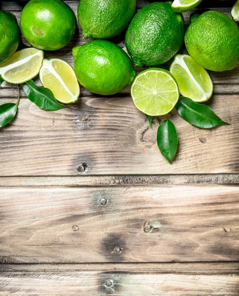 stock image Fresh juicy lime. On wooden background