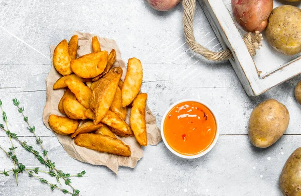 Baked Potato Slices Sauce Rustic Background — Stock Photo, Image