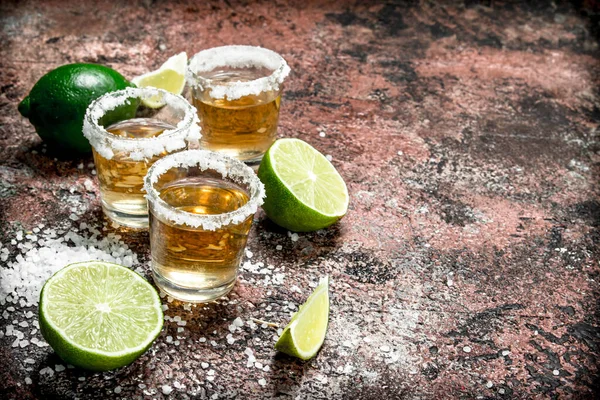 Tequila Shot Glass Salt Sliced Lime Rustic Background — Stock Photo, Image