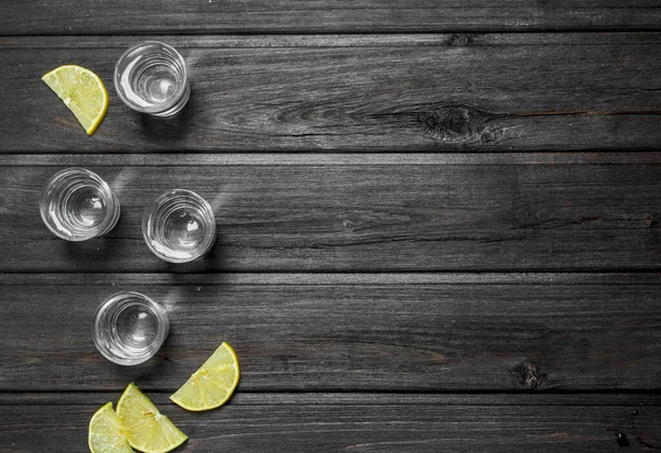 Vodka Shot Glass Lemon Slices Wooden Background — Stock Photo, Image