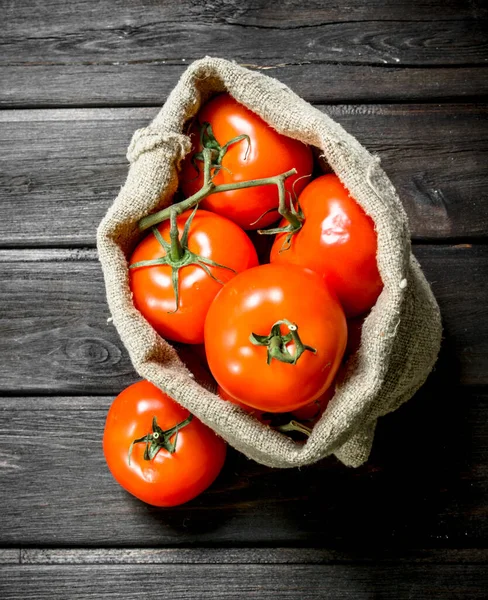 Czerwone Pomidory Worku Podłoże Drewniane Obrazy Stockowe bez tantiem