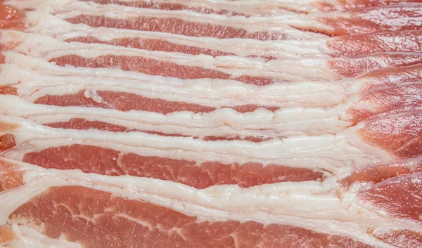 stock image Raw bacon texture. Selective focus