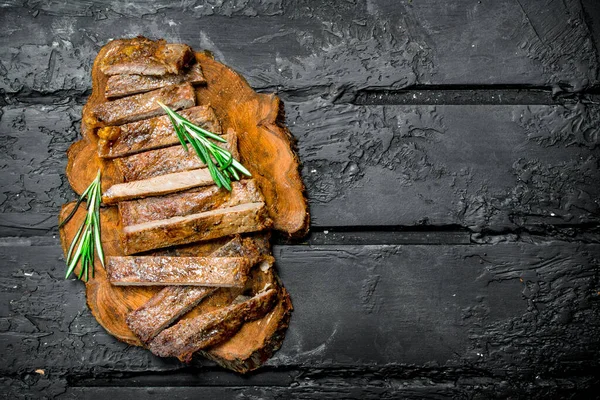 Grilled Sliced Beef Steak Rosemary Black Rustic Background — Stock Photo, Image