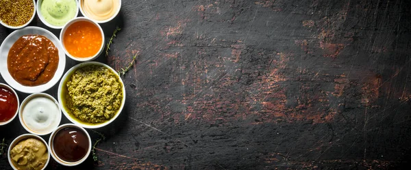 Barbecue Sauce Pesto Mayonnaise Mustard Thyme Sprigs Dark Rustic Background — Stock Photo, Image