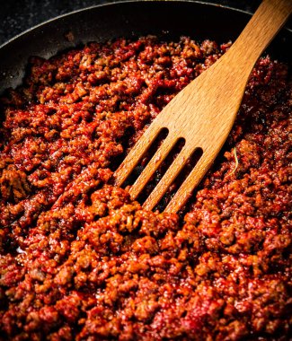 Bolonez sosu. Makro arka plan. Bolonez sosunun dokusunu. Yüksek kalite fotoğraf