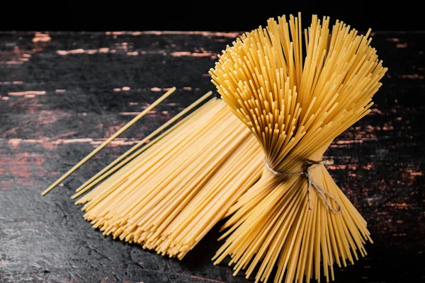 Spaghetti Dry Tied Rope Dark Background High Quality Photo — Stock Photo, Image