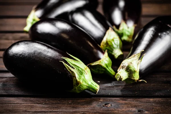 stock image Fresh homemade eggplant on the table. On a wooden background. High quality photo