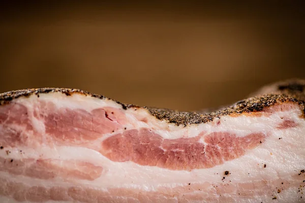 stock image A piece of delicious pork fat lard. On a wooden background. High quality photo