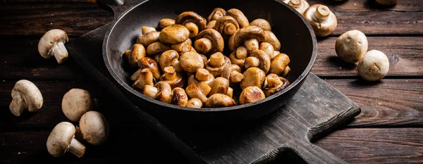 Fragrant Homemade Fried Mushrooms Frying Pan Cutting Board Wooden Background — Foto de Stock