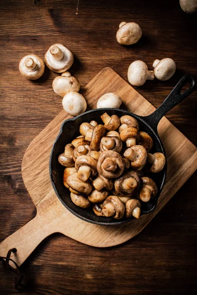 Fried Mushrooms Frying Pan Cutting Board Wooden Background High Quality — Foto de Stock