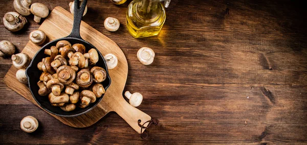 Fried Mushrooms Frying Pan Cutting Board Wooden Background High Quality — Foto de Stock
