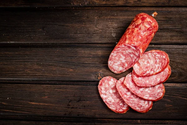 Sliced Delicious Salami Sausage Table Wooden Background High Quality Photo — Stock Photo, Image